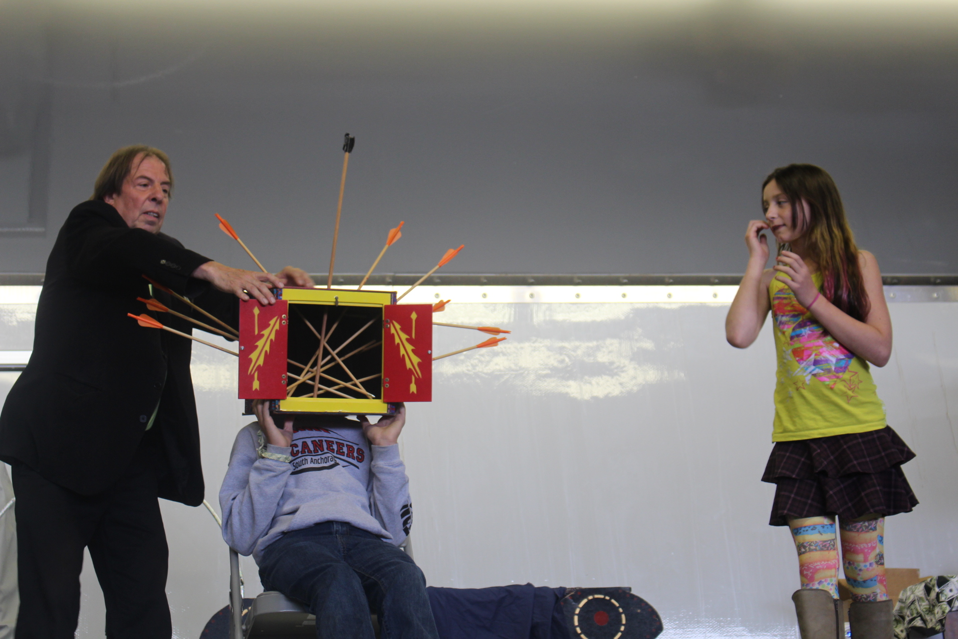 A man and a woman showcasing a magic performance